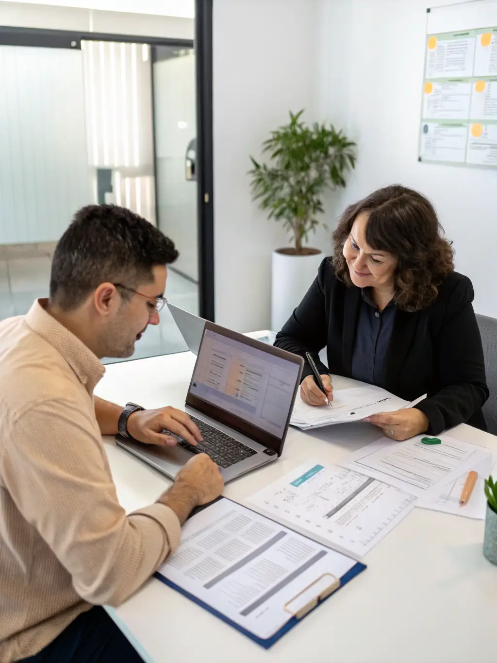 A coach guiding a business owner through financial statements and performance metrics, focusing on identifying areas for improvement and growth.